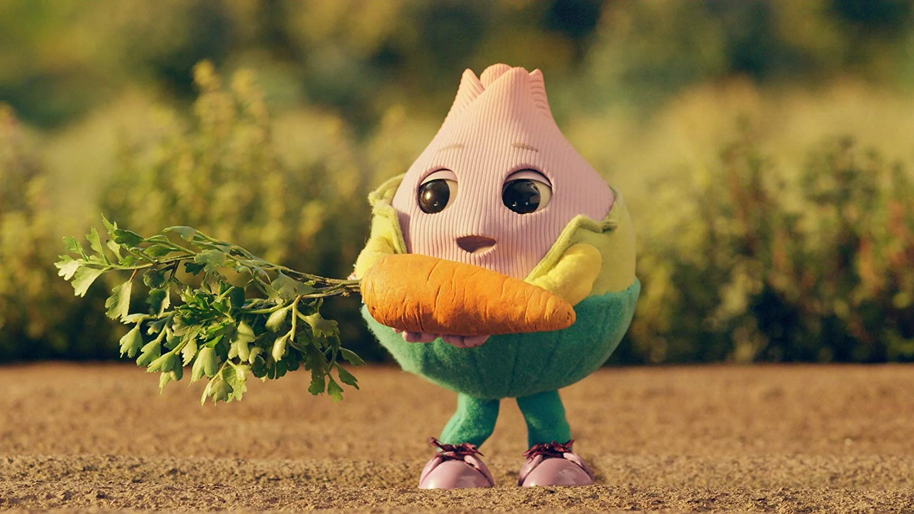 Mr. Onion holds a Carrot
