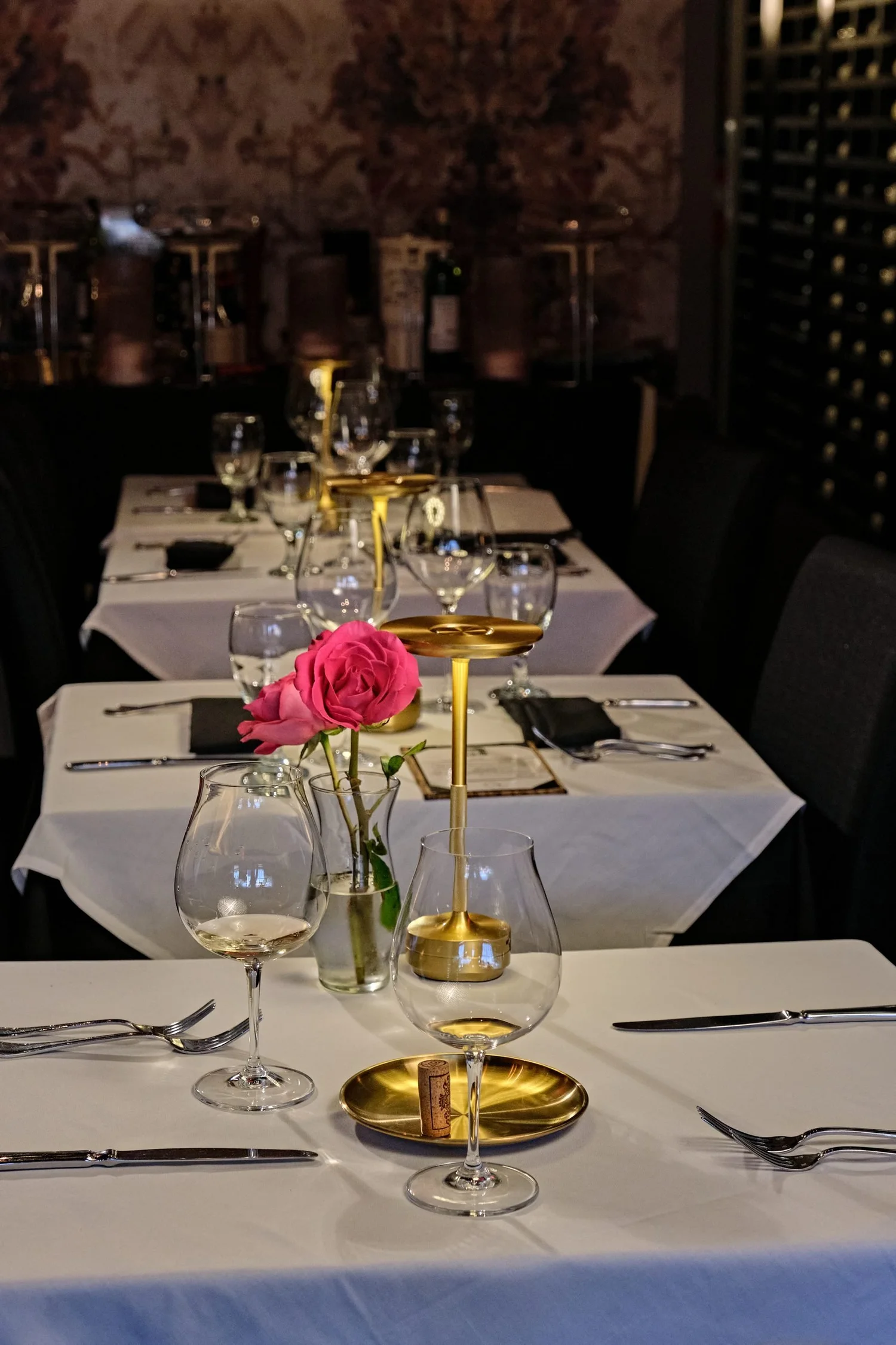 The candlelit dining room at The Black Pearl, a fine dining restaurant in downtown Dunedin, Florida