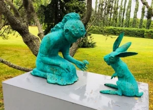 Simonsson, Kim: Girl Feeding a Two Headed Rabbit