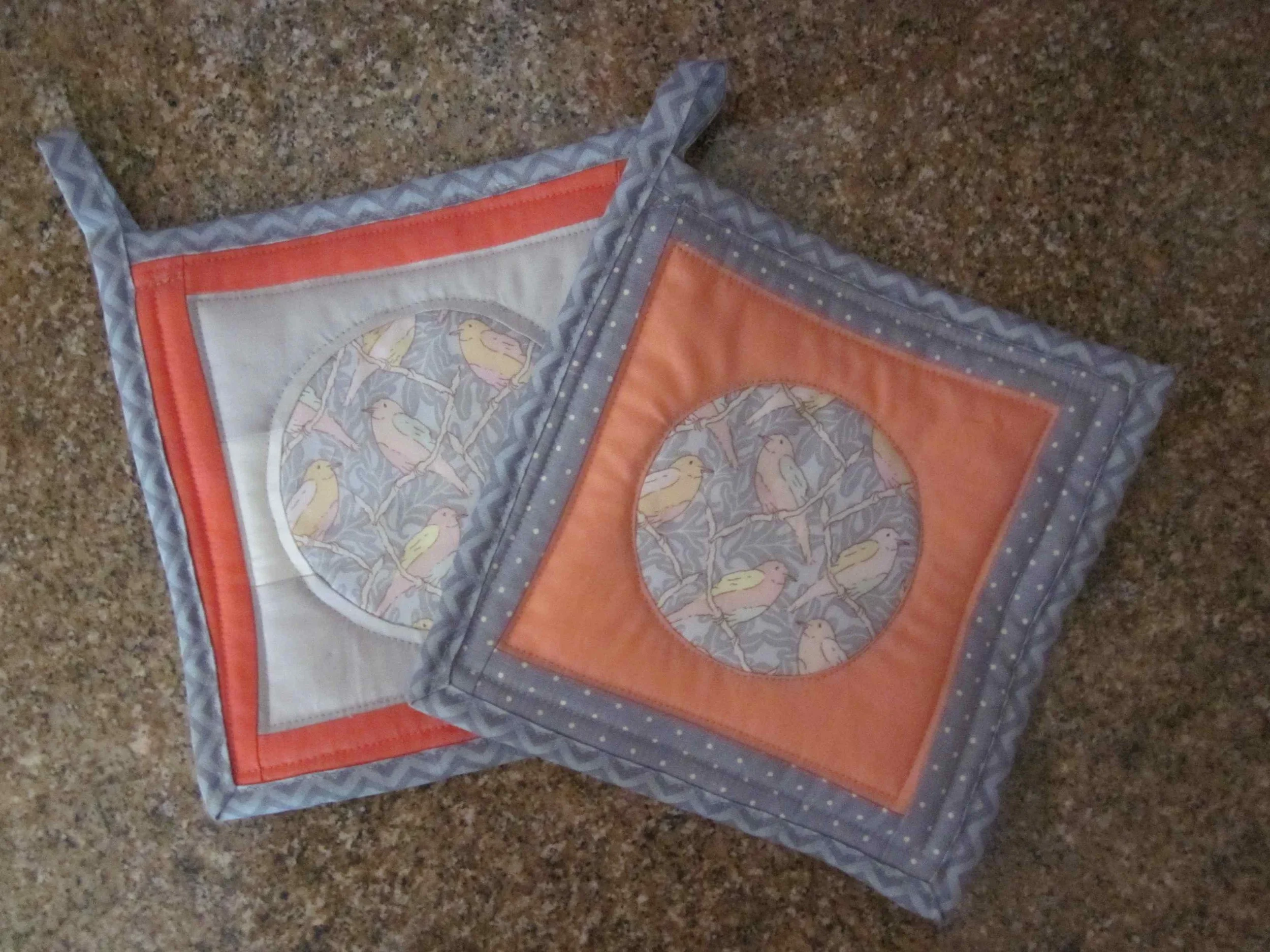 Quilts--Birds in a Circle potholders.jpg