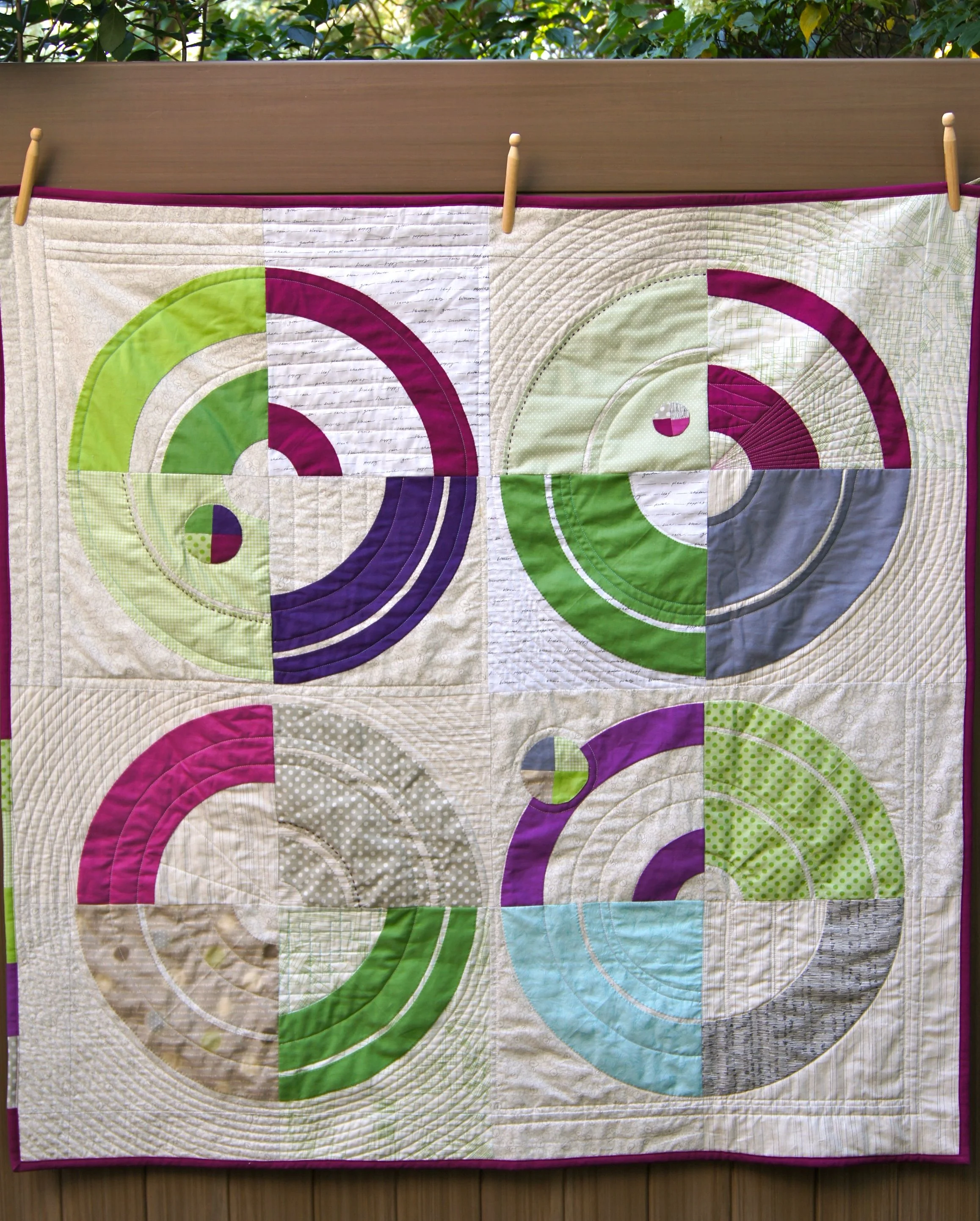 Bulls Eue Quilt, a Carolyn Friedlander Pattern from Savor Each Stitch. 45 x 45 inches