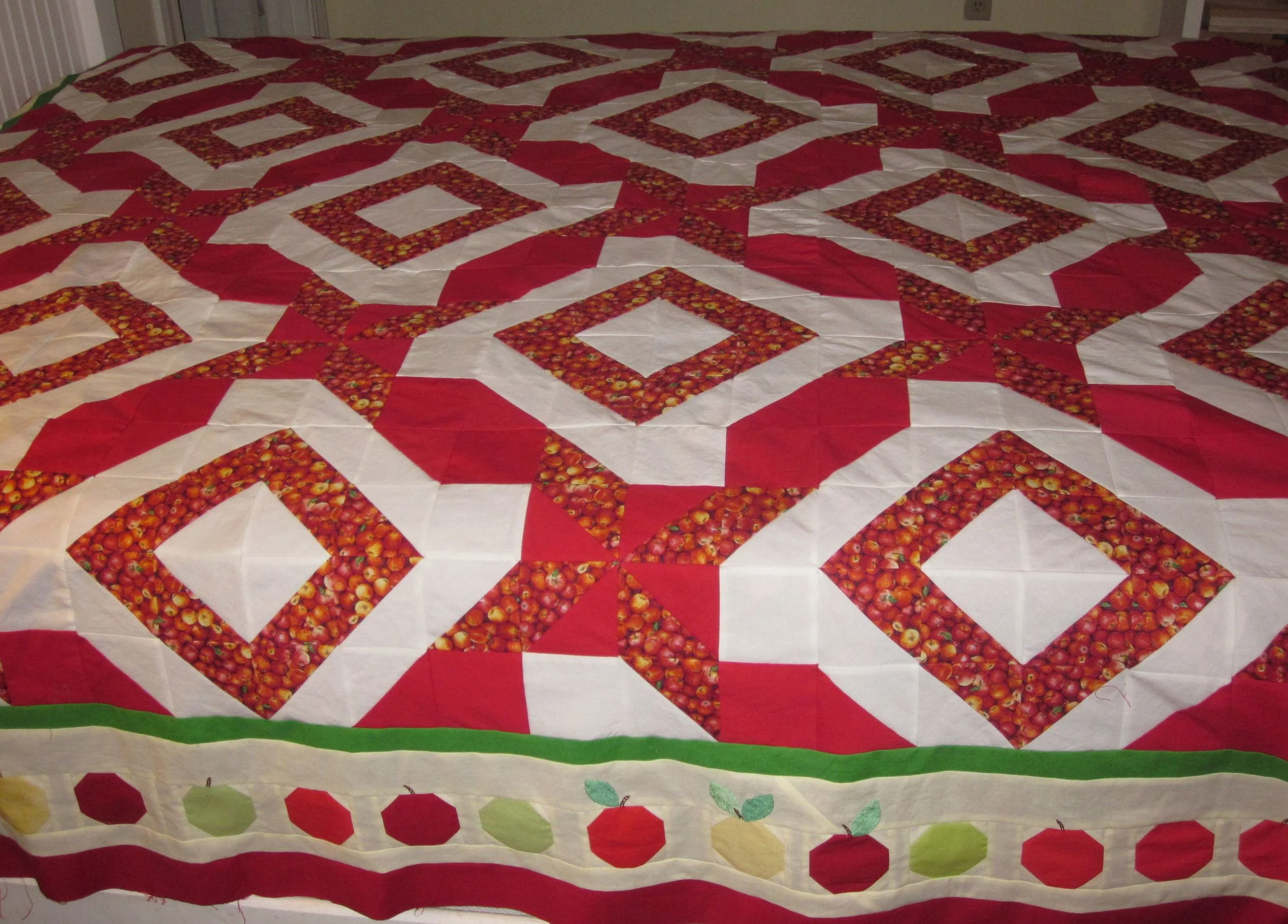 Apple Picking Time quilt top. A Quilters Club of America Mystery Quilt. The apple border is my design.