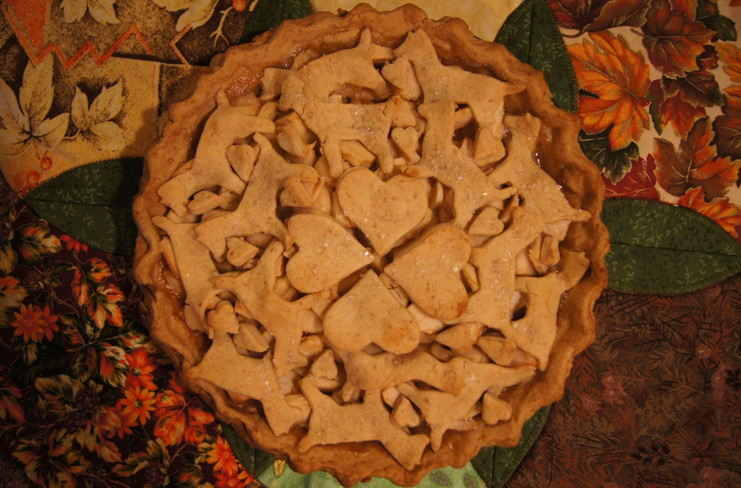 Apple pie, decorated with cut out dogs and hearts