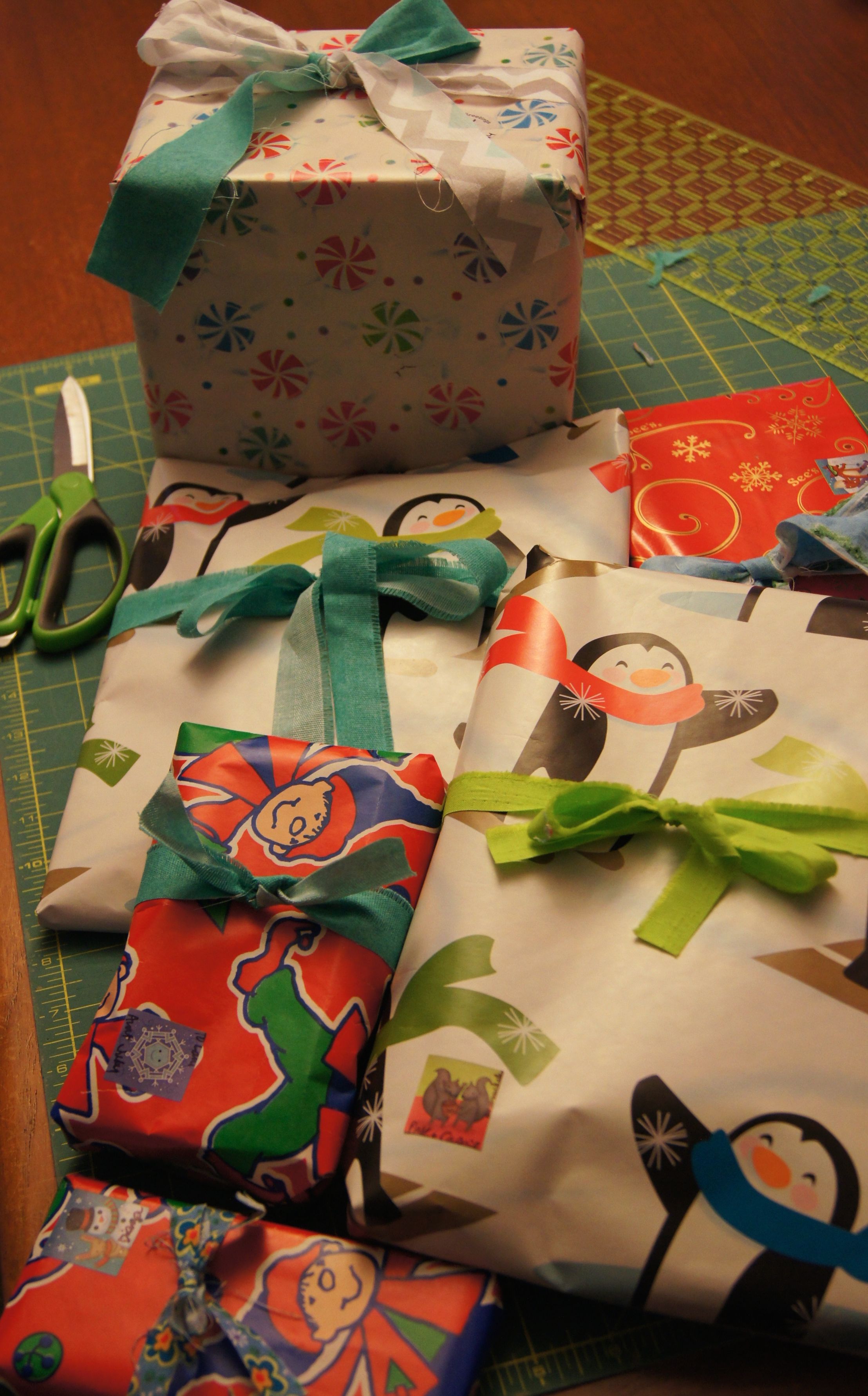 Gifts with fabric strip scraps in place of ribbons
