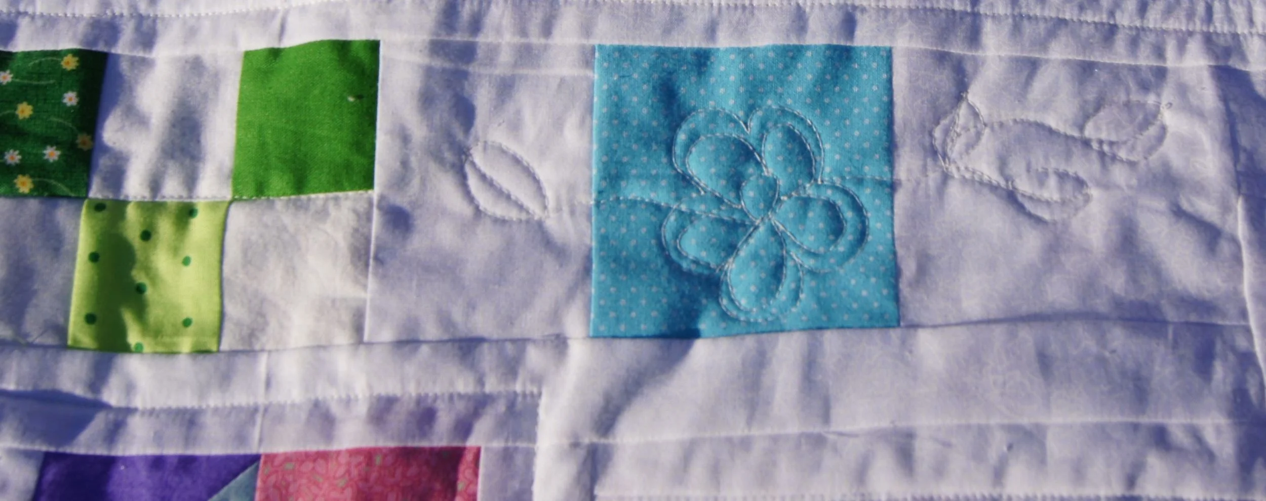 Quilt Construction Zone flower quilting.jpg