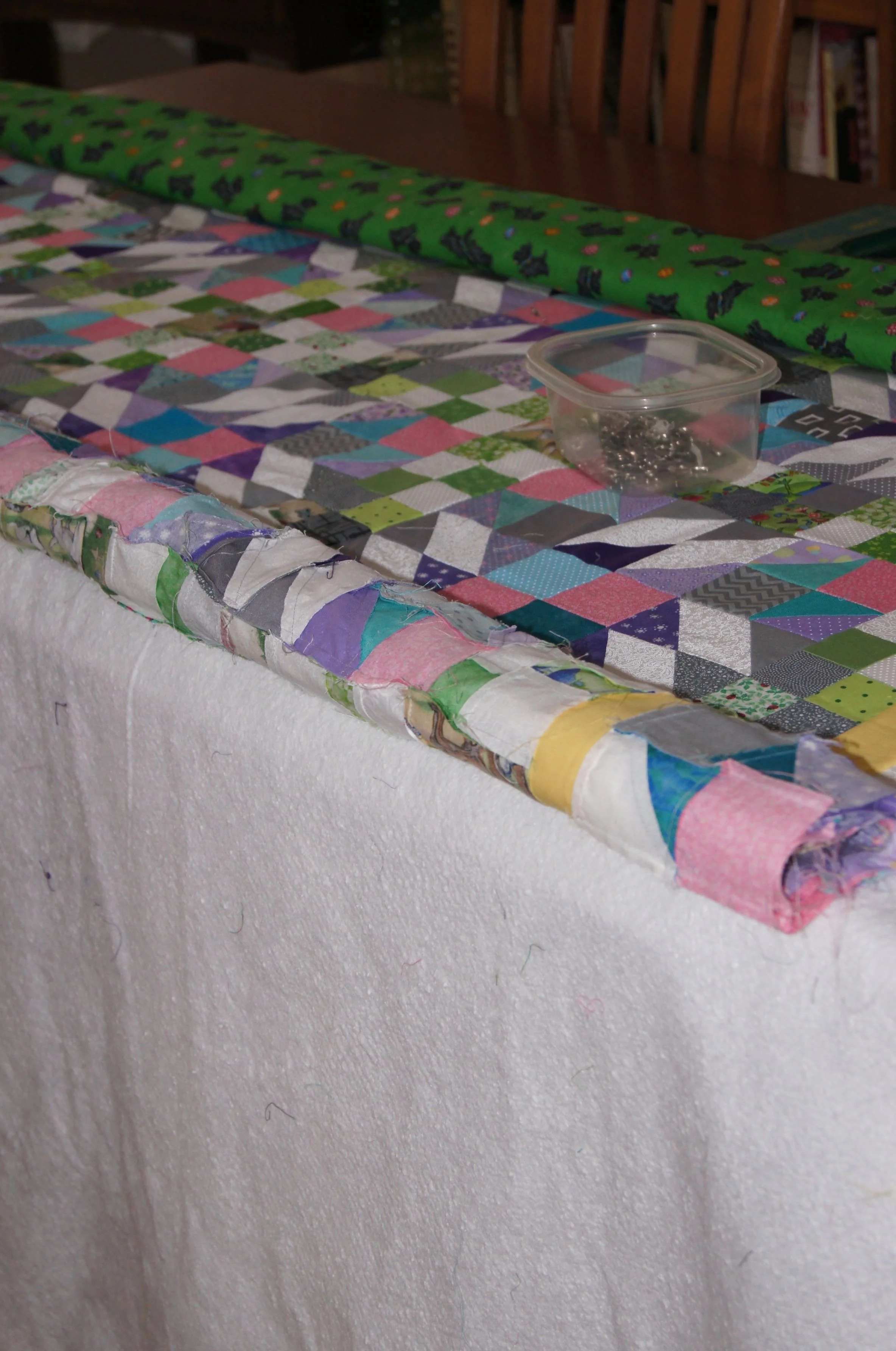 Board basting the Bonnie Hunter "Grand Illusion" Winter 2014 Mystery Quilt