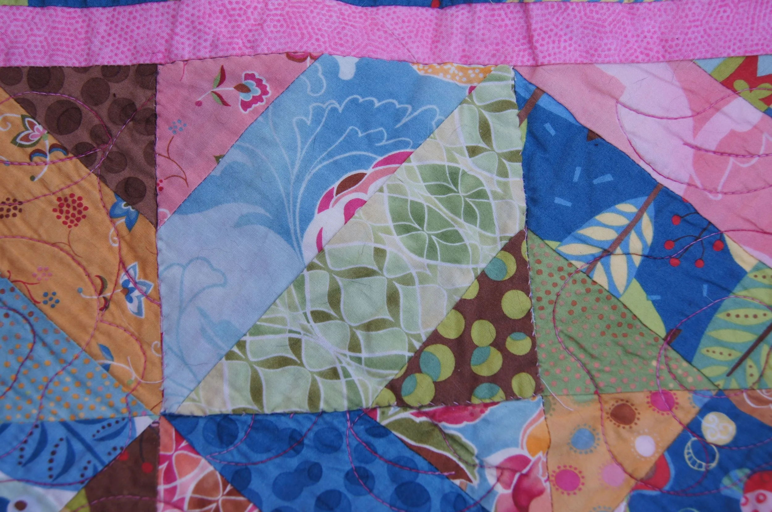Mending on the front of the Cats in Trees quilt