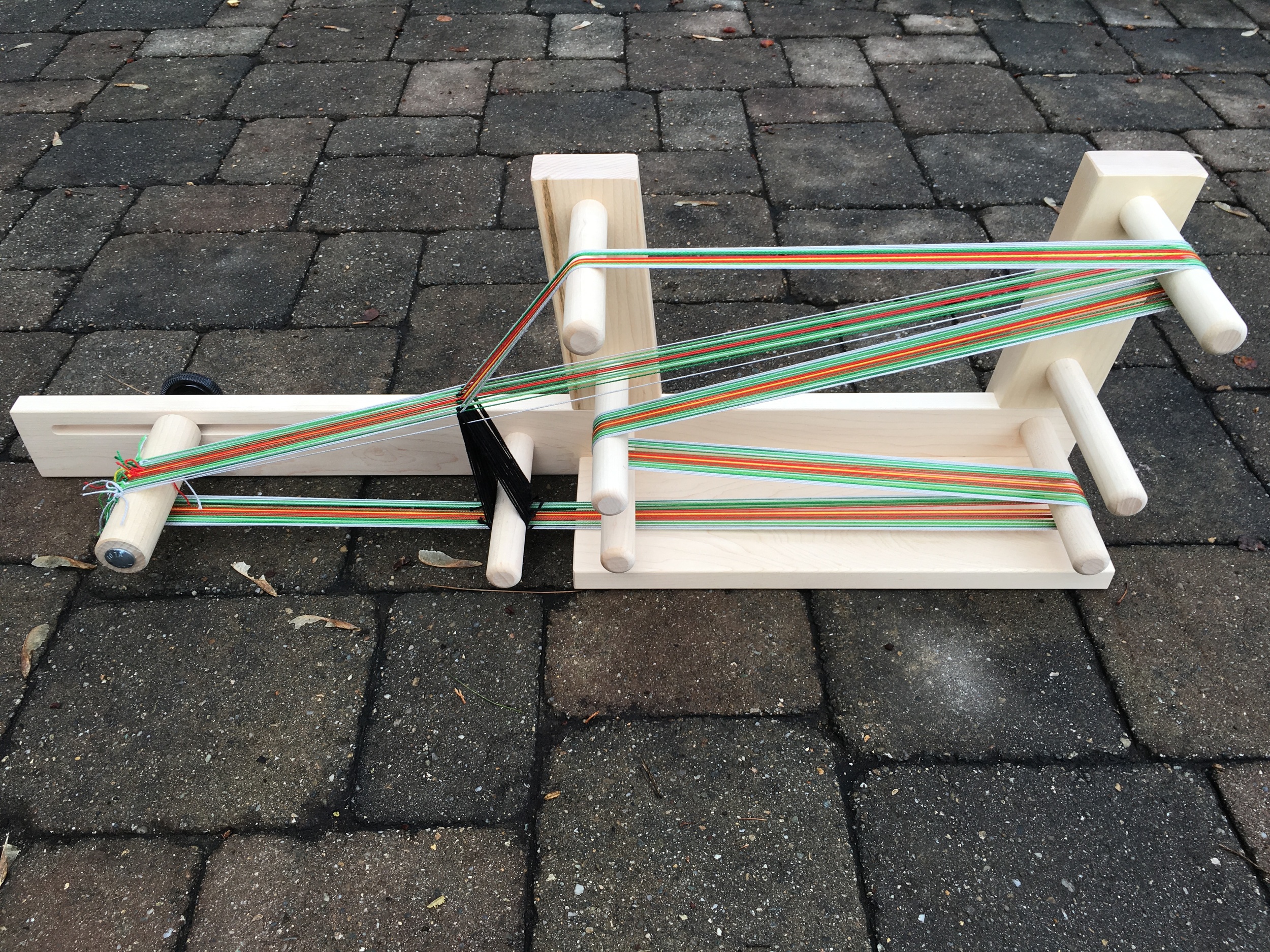 Inkle loom with a warp, ready to start weaving