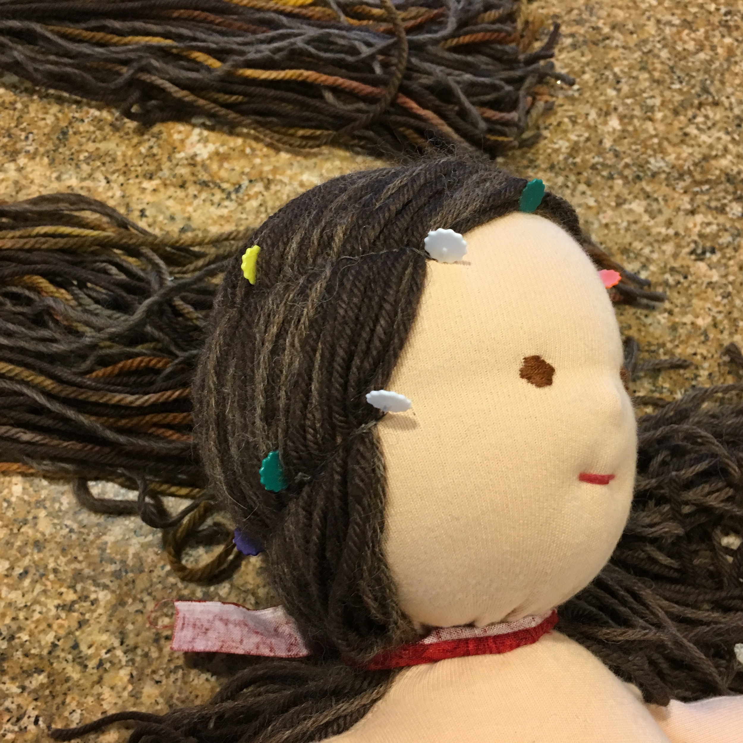 Doll Hair stitching marked with flower pins.jpg