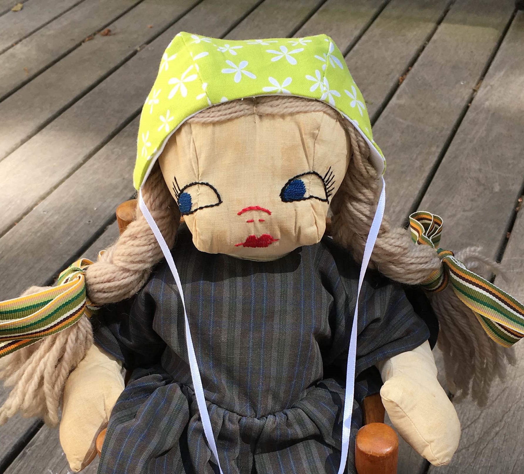 Doll cap from 1858 magazine pattern