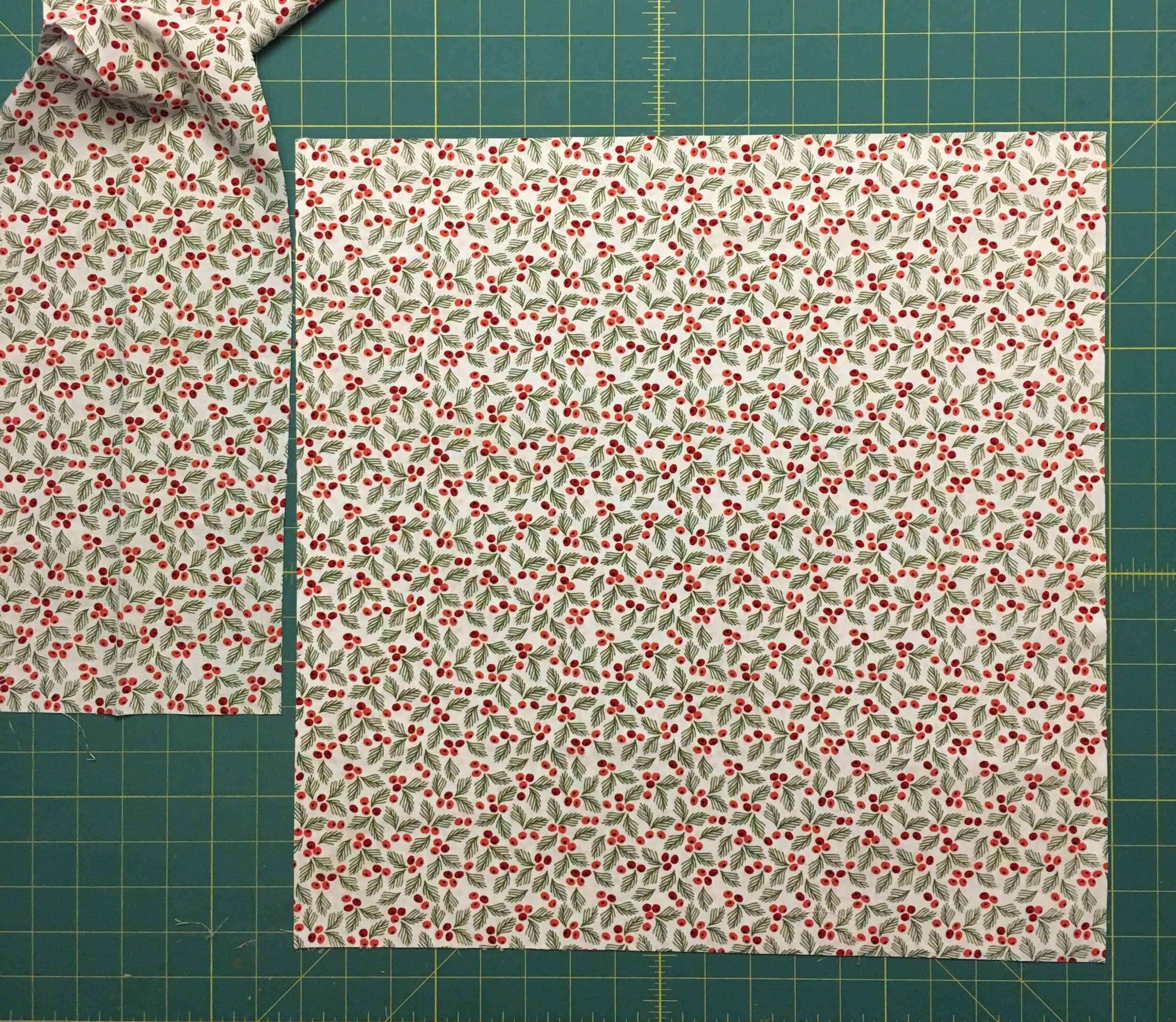 The cut napkin with the left over strip along the FOLD of the fabric.
