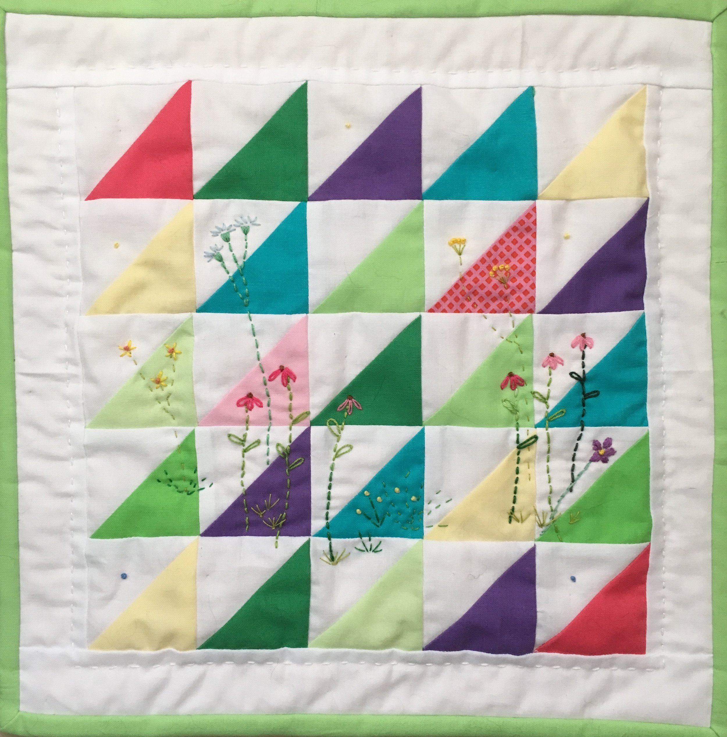HalfSquareTriangleEmbroideredMiniQuilt.jpg