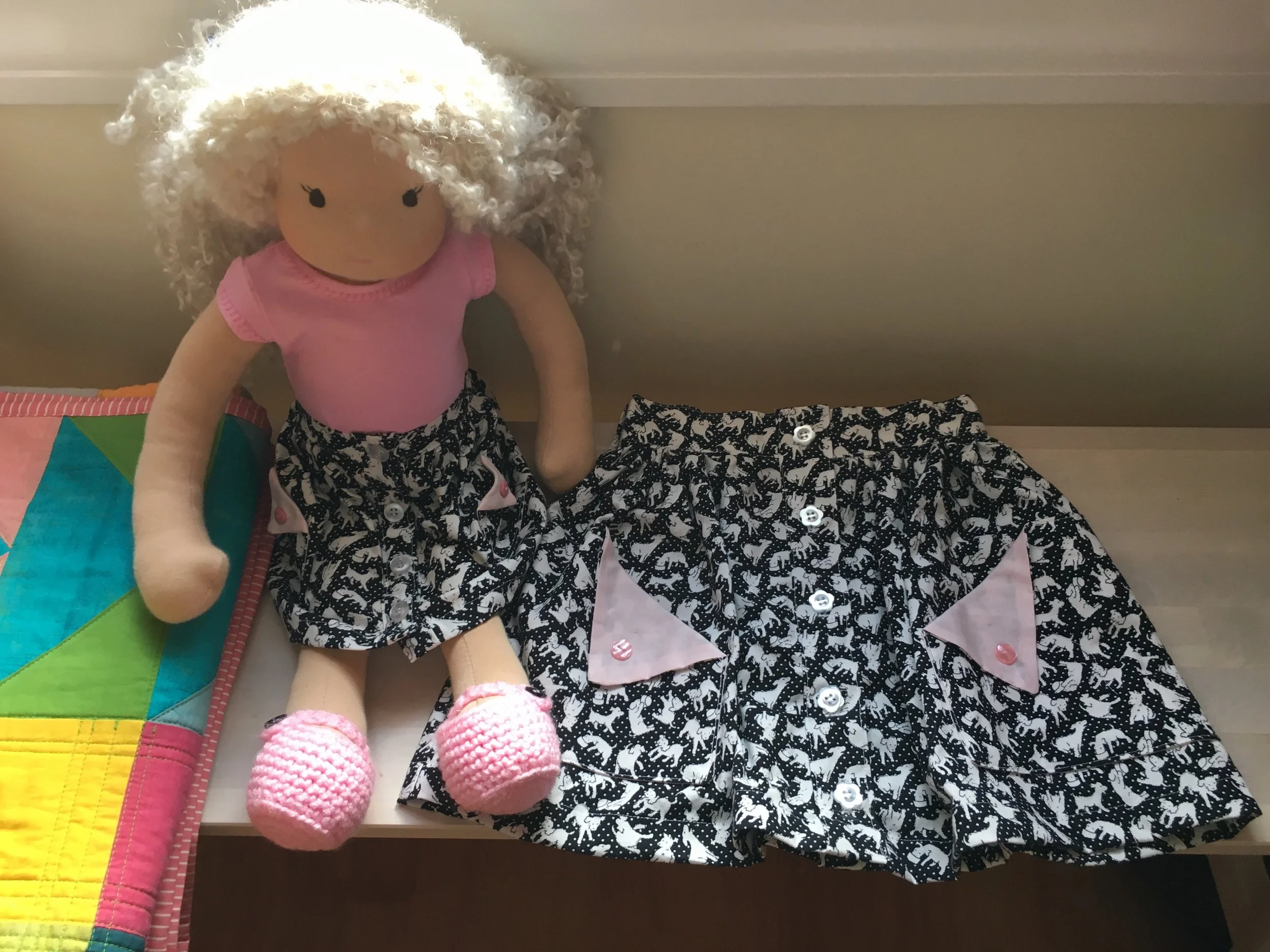 Olive ann designs Buttons Skirts and Pixie Faire T shirt. The doll is a Bamboletta Forever Friend.