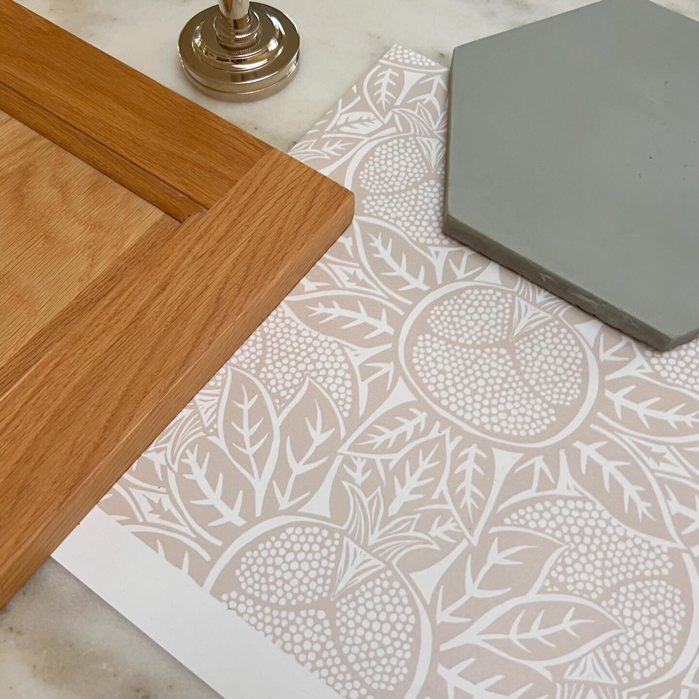 Adding the final detail to our master bath remodel - wallpaper! I settled on my Pomegranate Block Print in this soft beige. The fixtures are nickel and the flooring is a cement tile in Basil green from @cletile - feels so good on your feet! The wallp