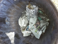 pots in paper in trash can.jpg