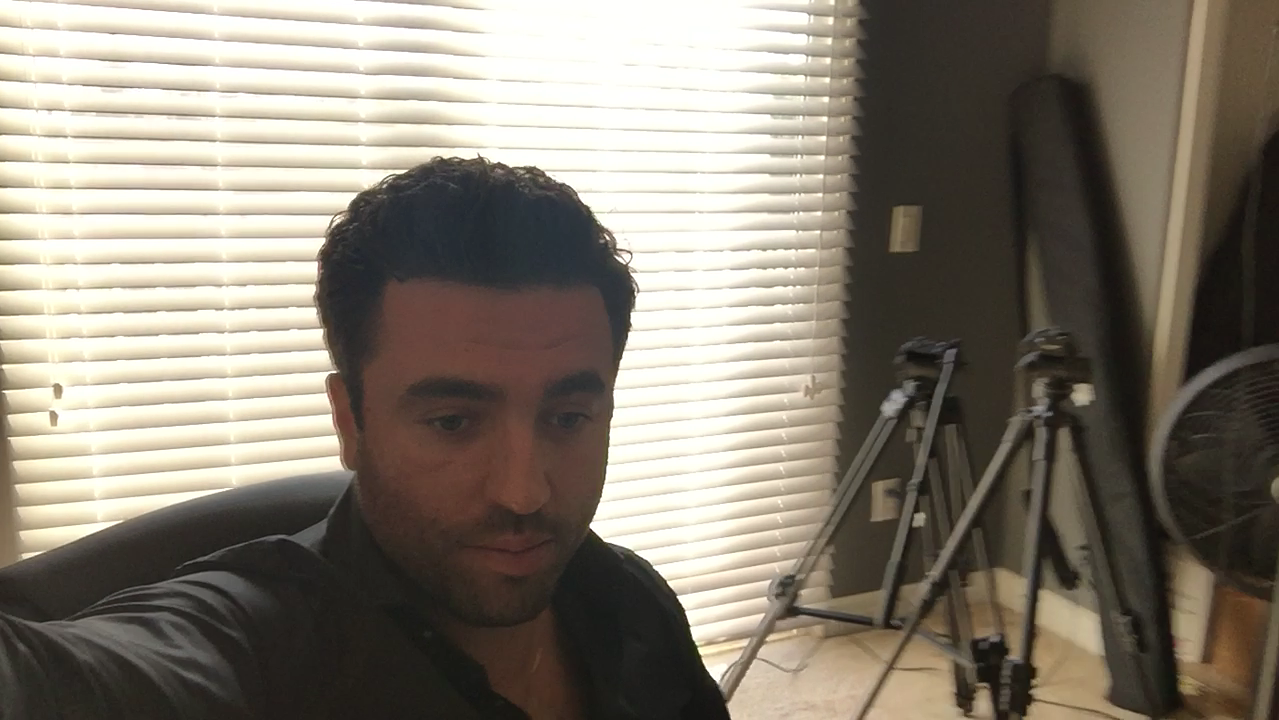 1 - Selfie Modie with cluttered background = Bad