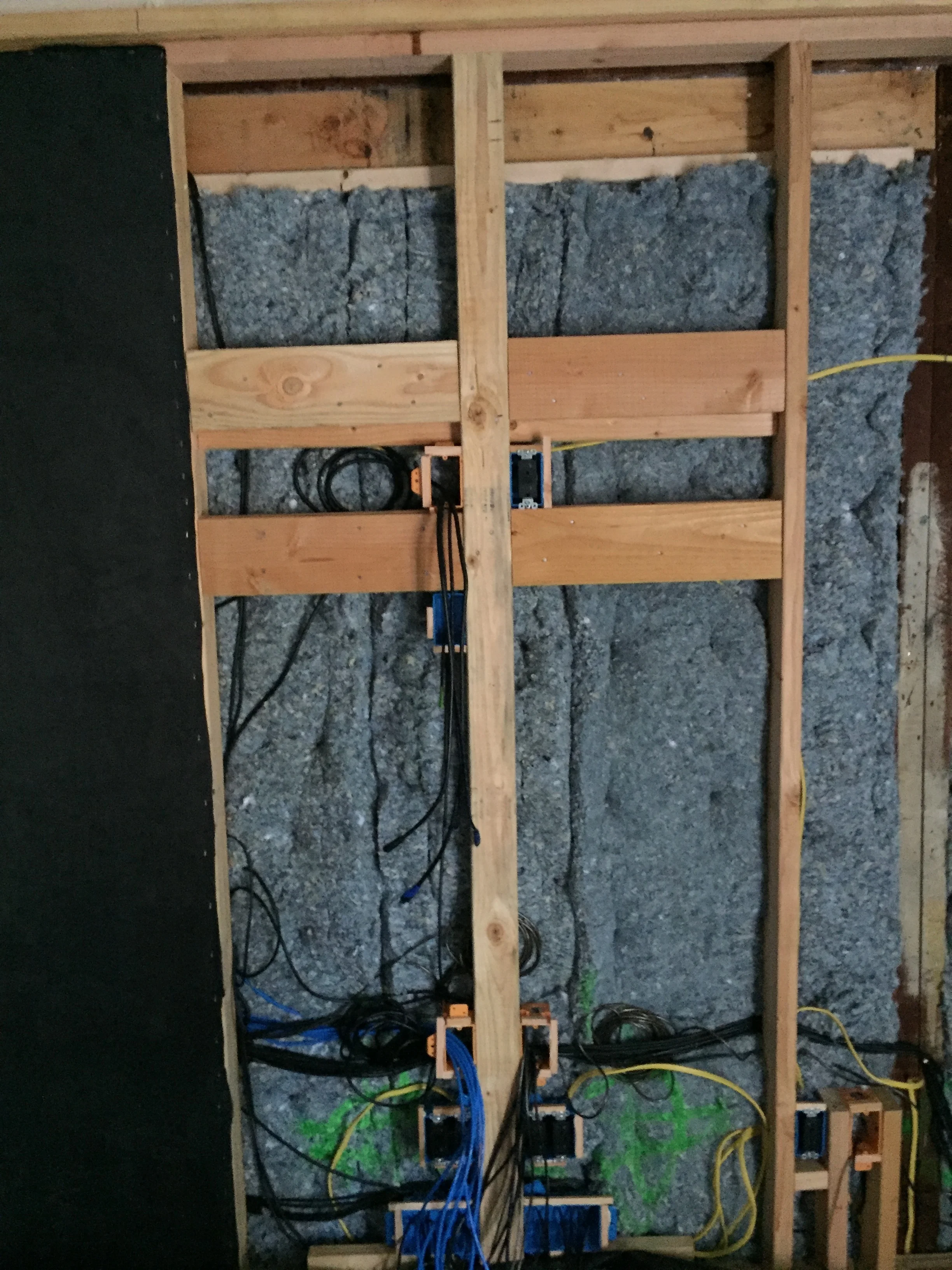 HDMI cabling, internet cabling, sound cabling and support wood to mount the TV to at the front of the room. 