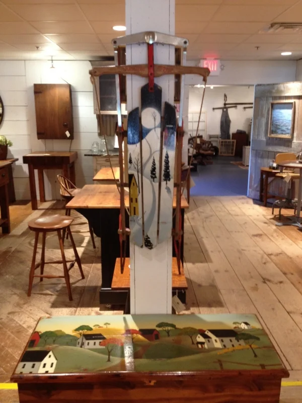 "Night Sledding" sled and trunk - with Huntley Pond painting in the background