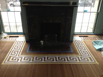 Stencil wrapped around hearth with corner "turns"