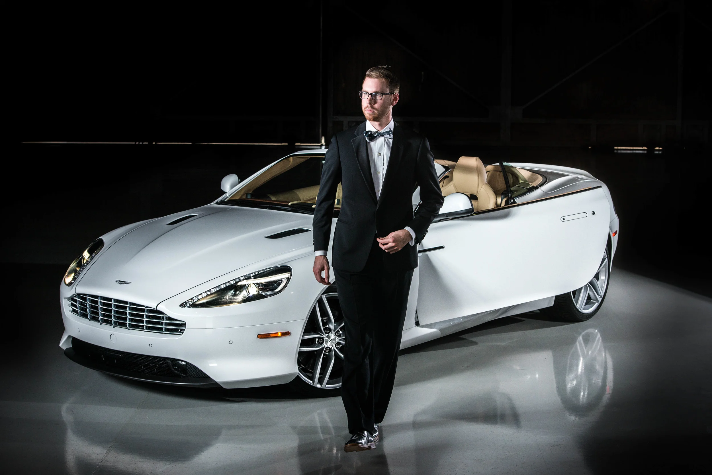 Tuxedo: Armani Collezioni, Shirt: Ledbury, Tie: The Tie Bar, Shoes: Crosby Square, Glasses: Burberry, Car: 2014 Aston Martin DB9 Volante(courtesy Foreign Cars Italia), Photo: Alec Hutchins Photography, Model: Noah Williams  