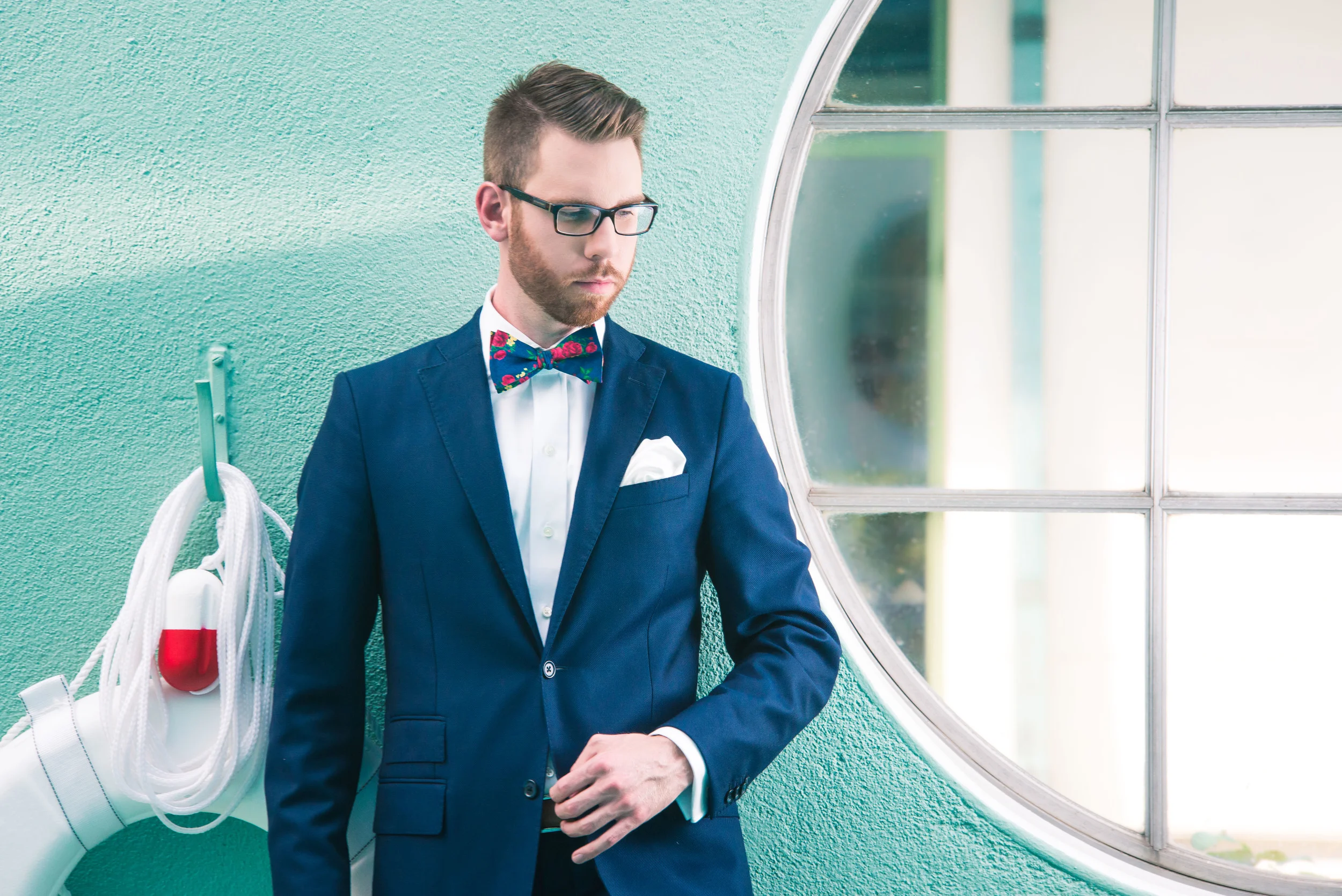 Suit: J. Lindeburg, Shirt: Ledbury, Tie: The Tie Bar, Glasses: Burberry, Location: Reynolda House Museum of American Art historic indoor pool.