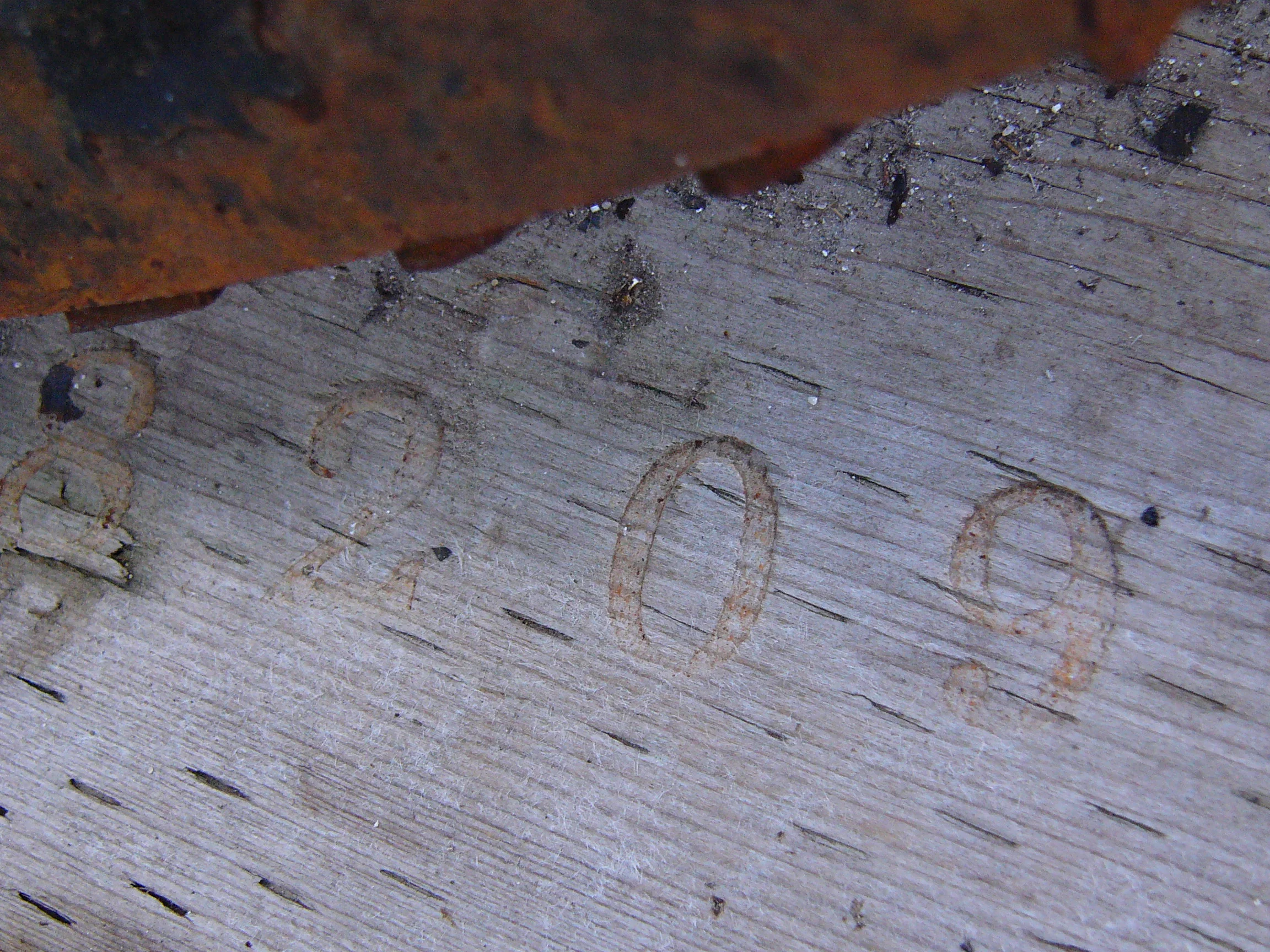  Pi Detail of impressions on wood 