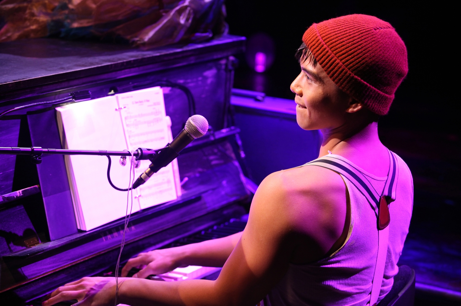 Telly Leung in Godspell .