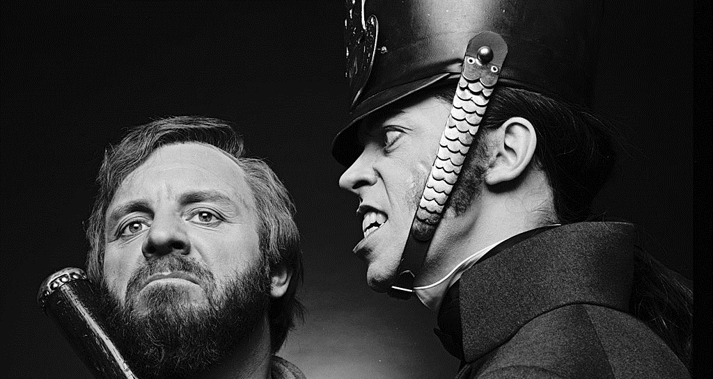 Colm Wilkinson and Terrence Mann in Les Misérables .