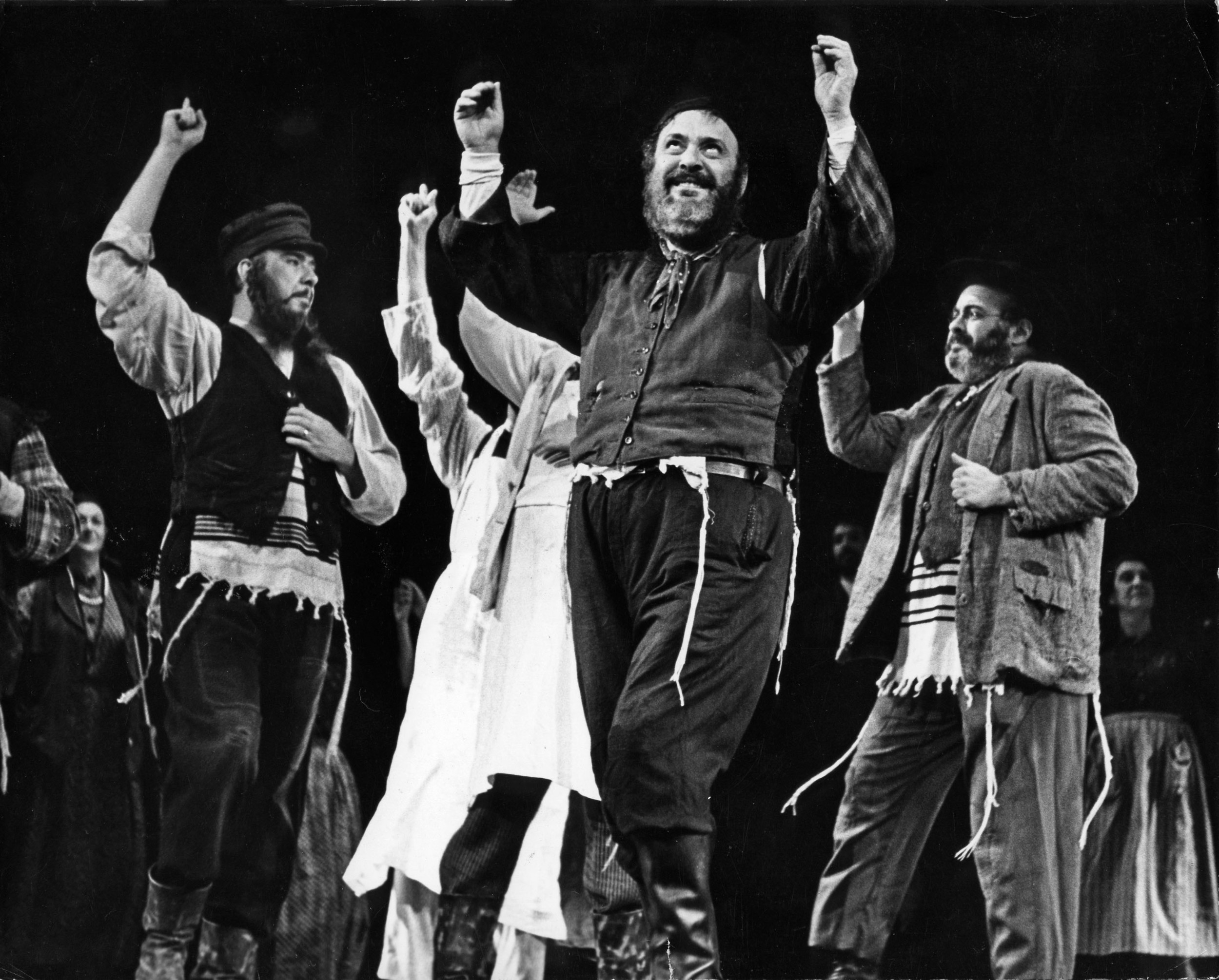 Zero Mostel leads the company of Fiddler on the Roof in "Tradition."