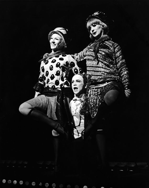 Mary Ehara, Joel Grey and Rita O'Connor perform "Two Ladies" in Cabaret .