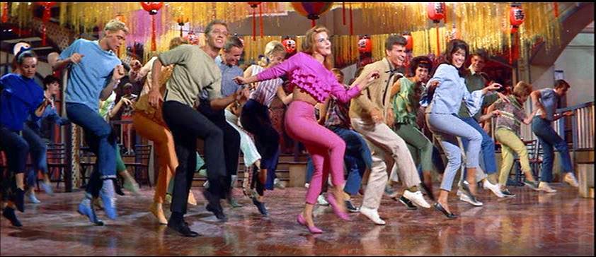Ann-Margaret leads "A Lot of Livin'" in the film.