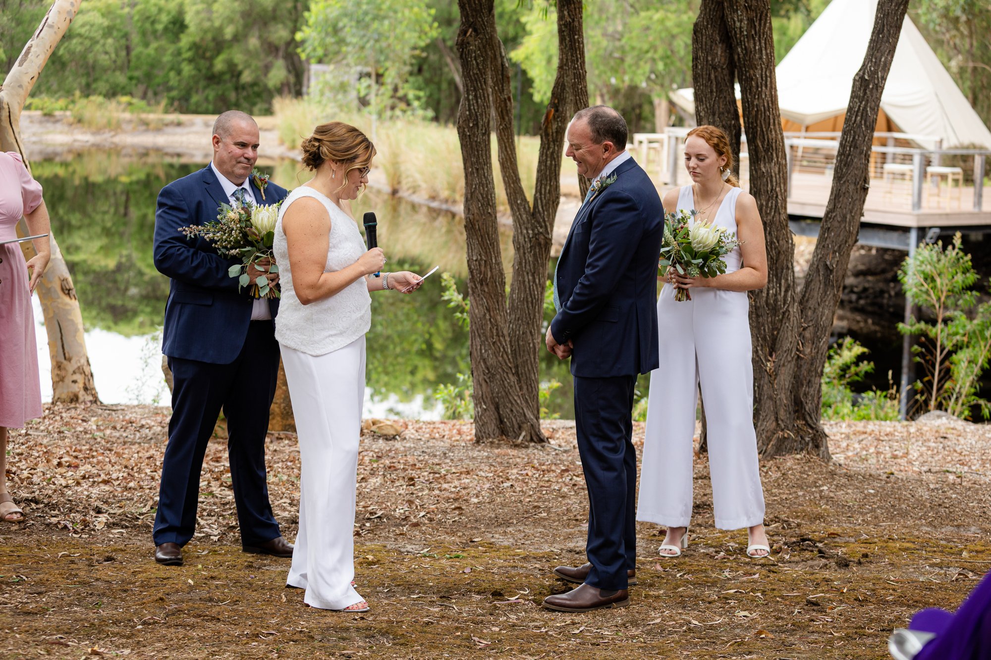 bride exchanging vows with her groom