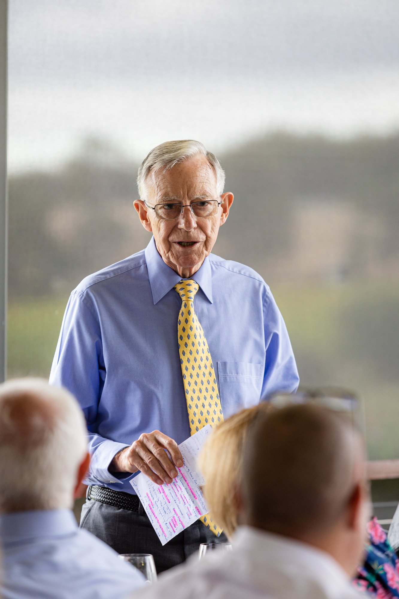 man standing at a reception