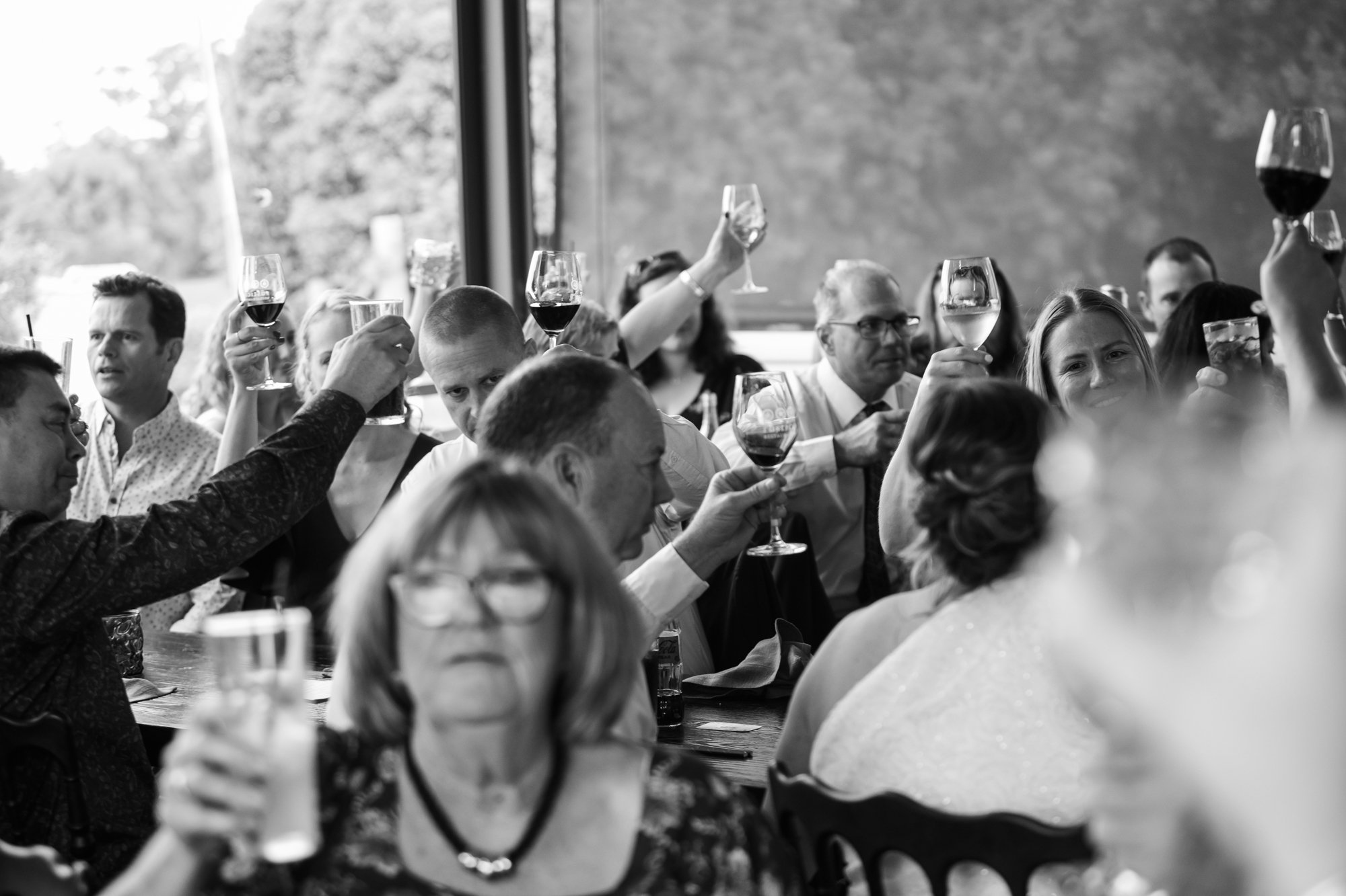 raising a toast at a wedding reception