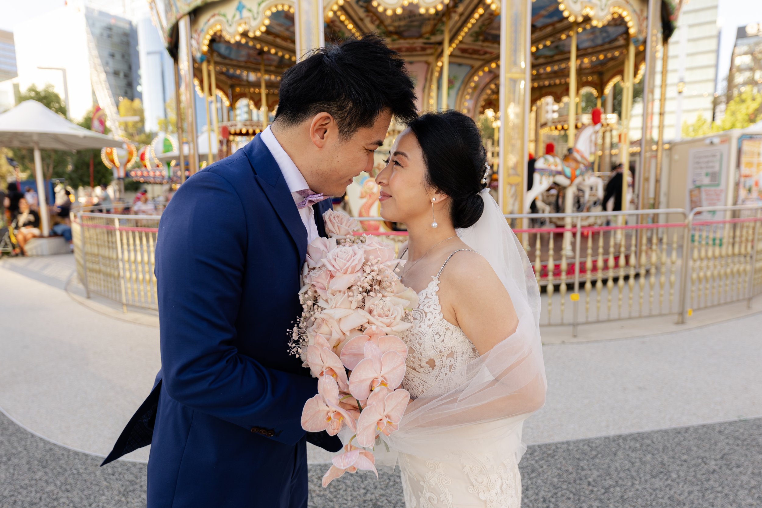 bride and groom pictorial in a carousel