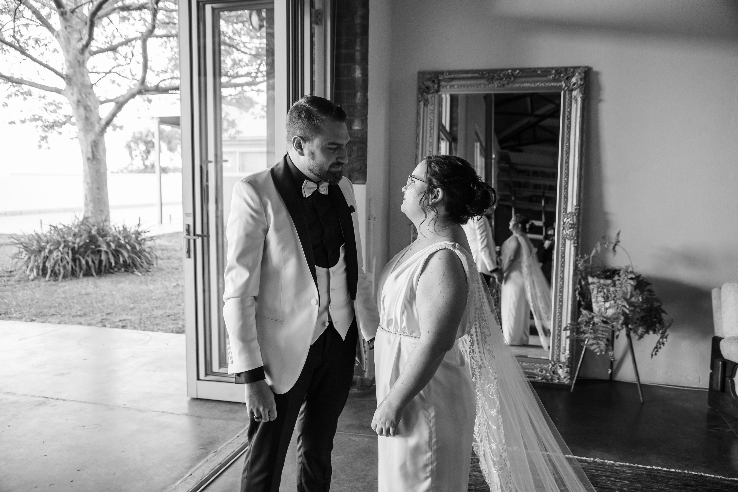 black and white couple looking at each other