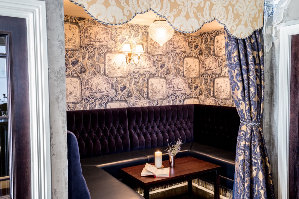 Six Storeys interior, a curtained corner booth
