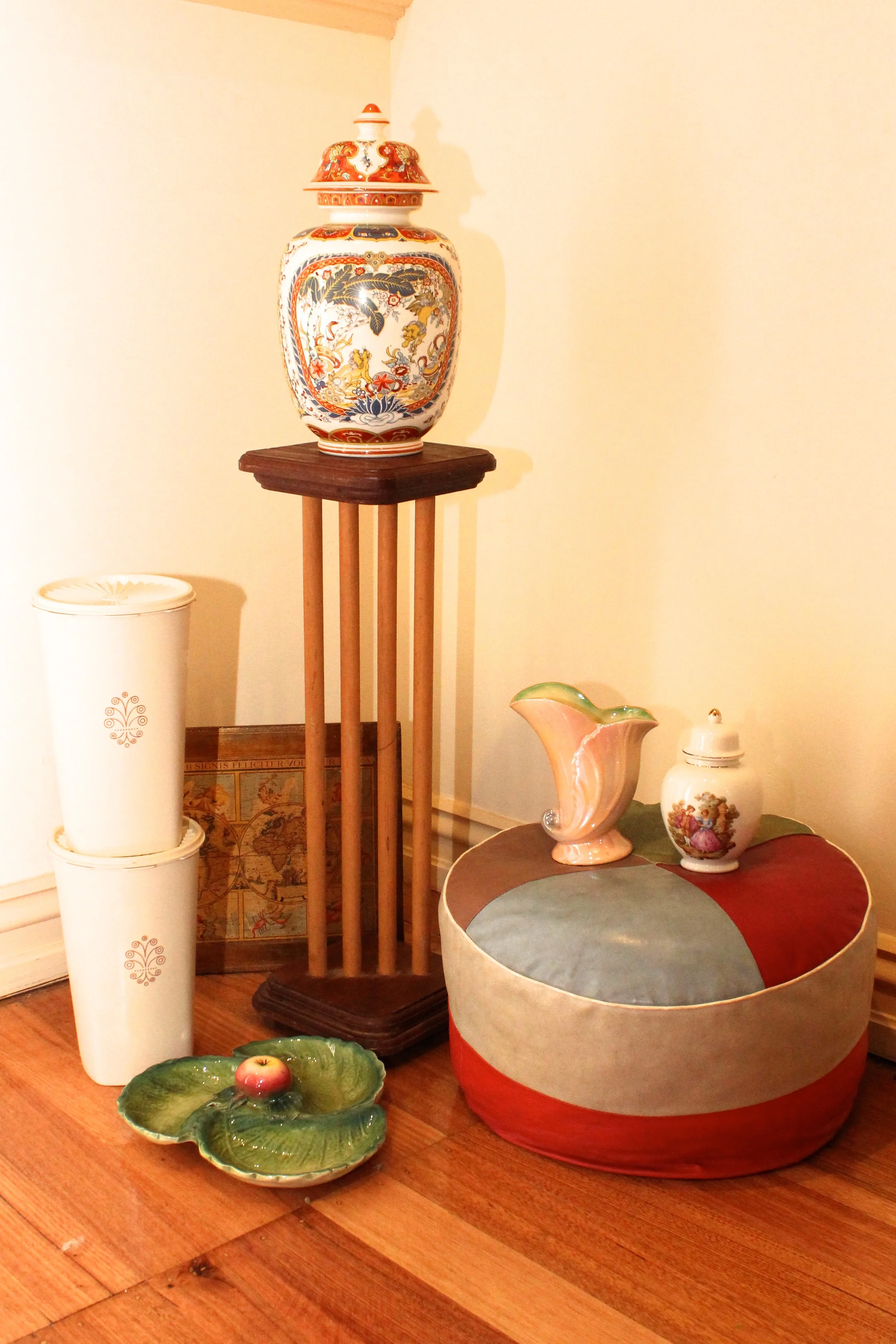 Vintage Finds including Edrex Leather Poof and Italian Urns and platters