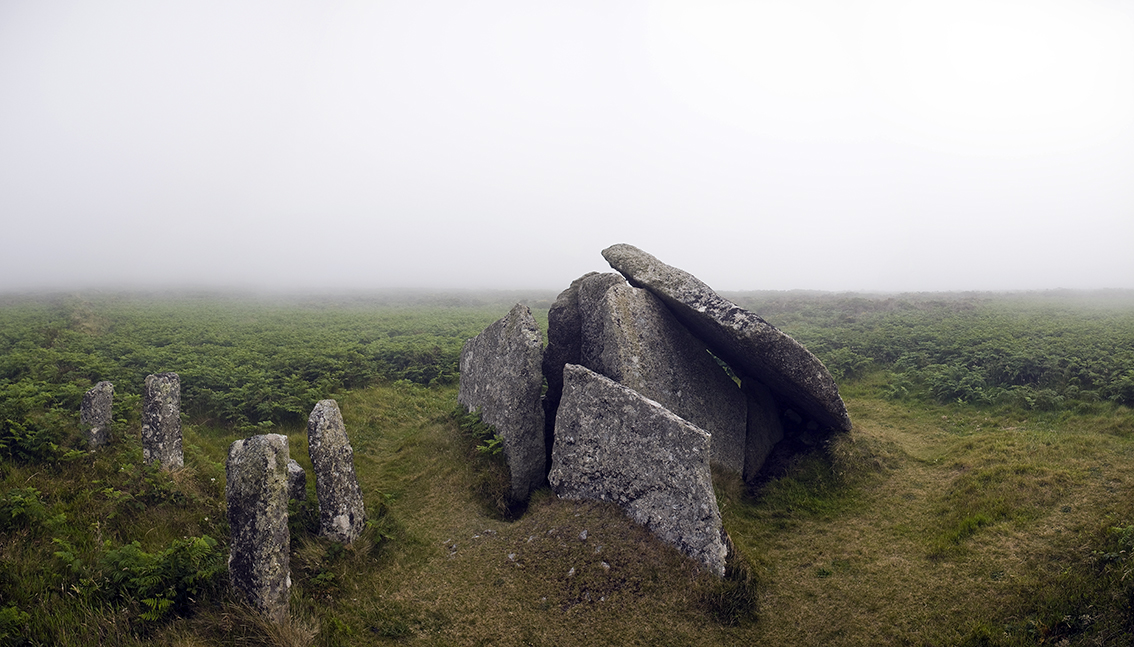The upright stones to the left were the beginnings of a farm building before William Copeland Borlase, a local antiquarian, intervened