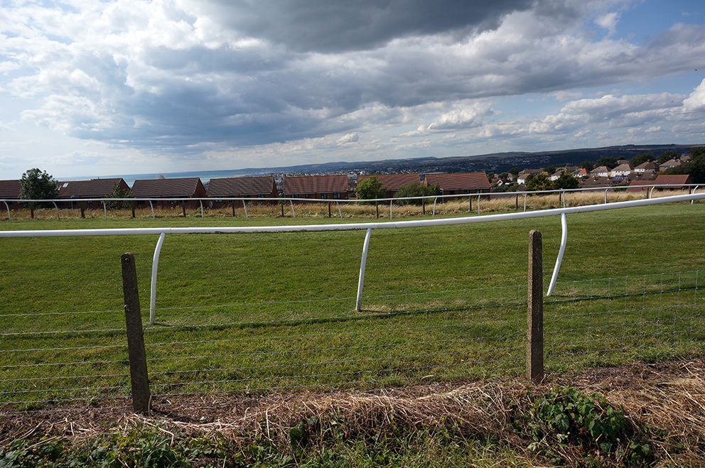 The dip in the railings of the run-off track indicates the forth, and possibly, outermost ring of the enclosure.