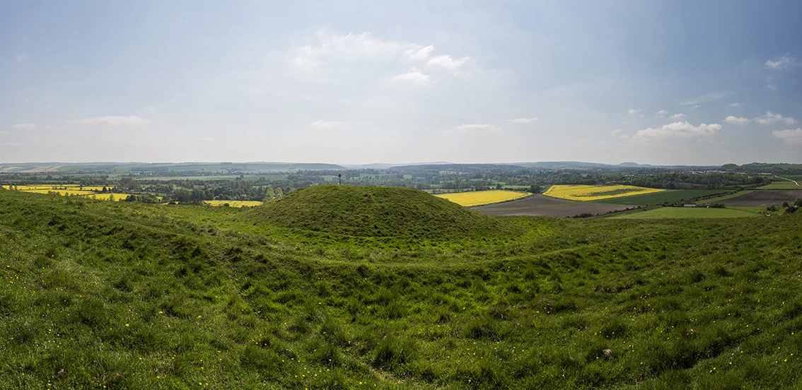 A solitary Bronze Age barrow within the ramparts of Scratchbury IA hill fort