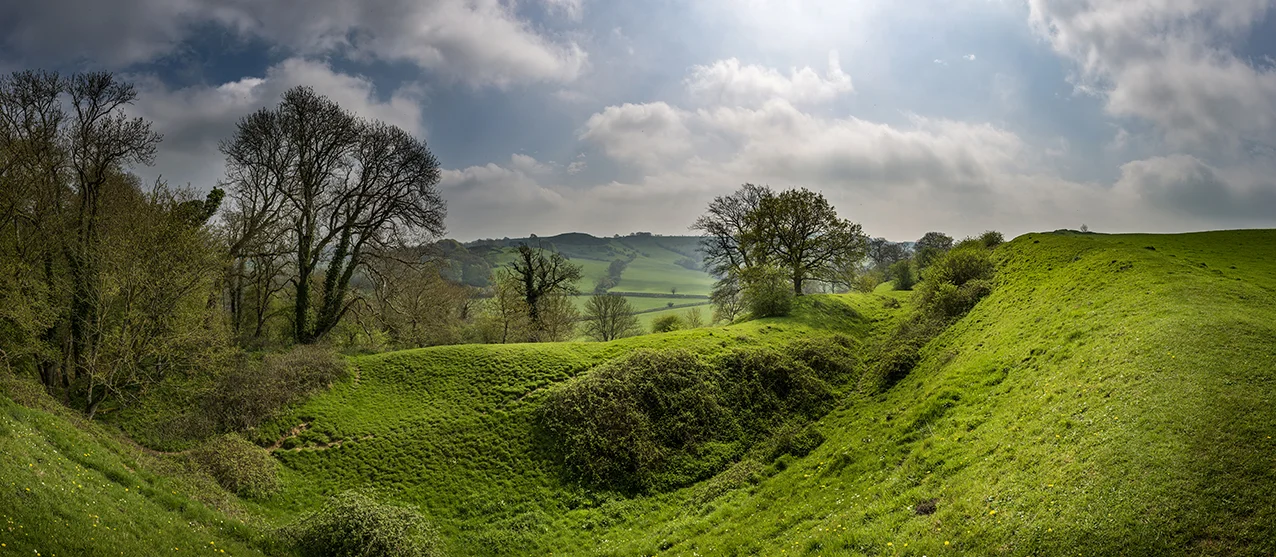 The huge earthworks of Cadbury Castle near the North East entrance