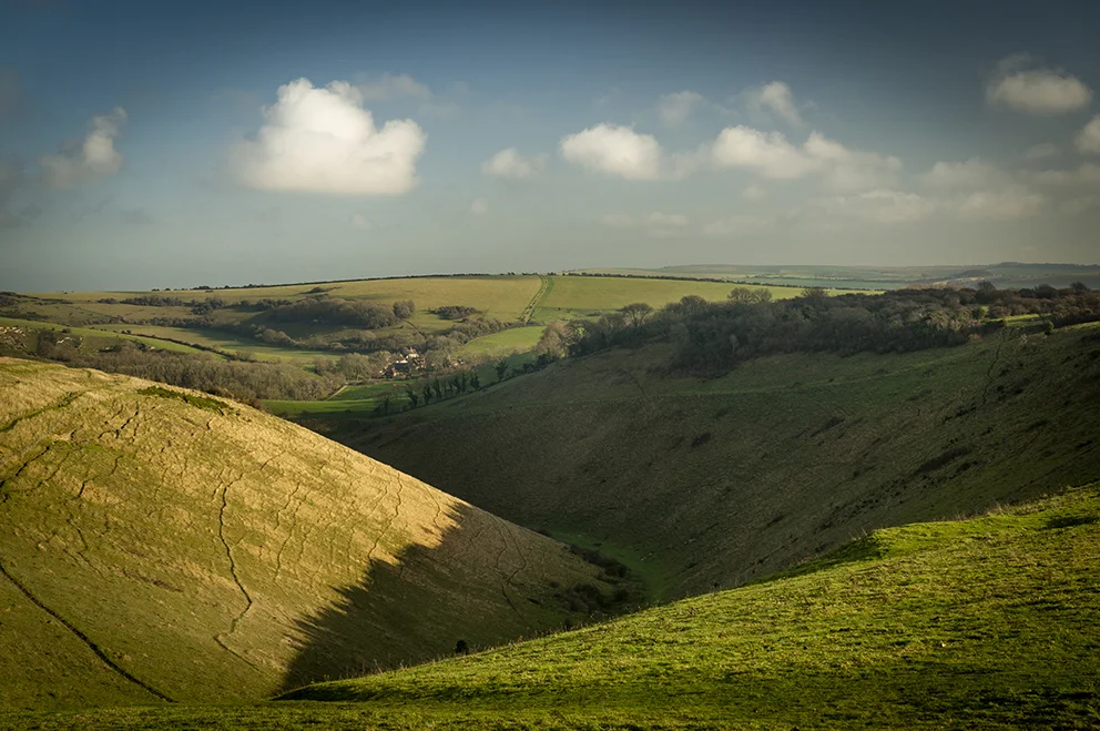 Looking back down the steep sided valley from the road up from Hove