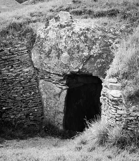 The impression of the fossilised ammonite in the left hand entrance stone