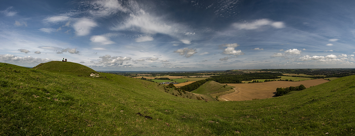 Panorama looking North with the larger Bronze Age bowl barrow on the left and Little Cley Hill just off centre