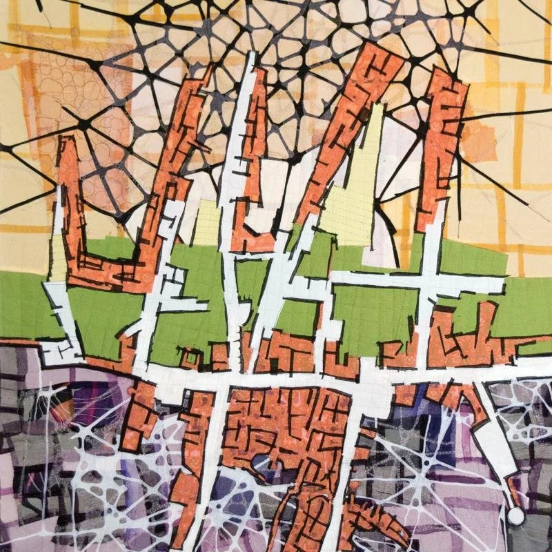 Colorful, abstract map of a city with streets, buildings, and green spaces.