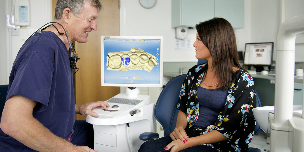 Rob discussing the CEREC treatment with a patient.