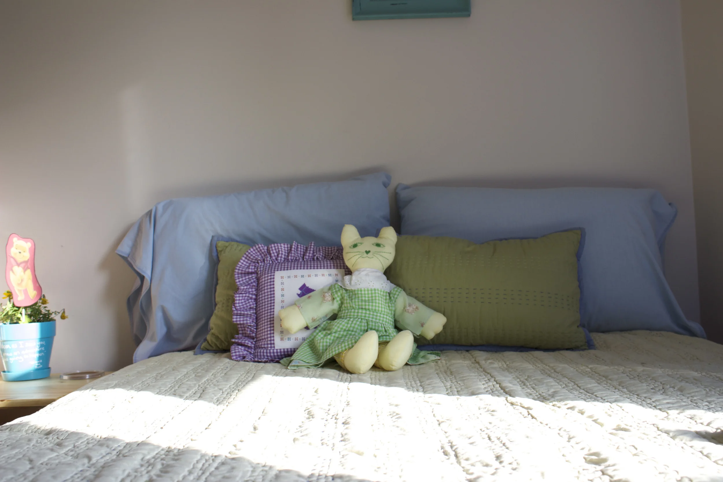  Grandma's stitchwork. On the guest bed just like it was at grandma's house. :-)&nbsp; 