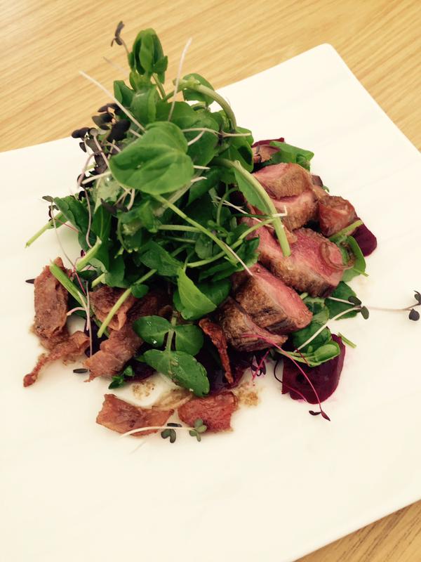 A salad of locally shot pigeon breast, beetroot and watercress with a pickled shallot and bacon dressing.