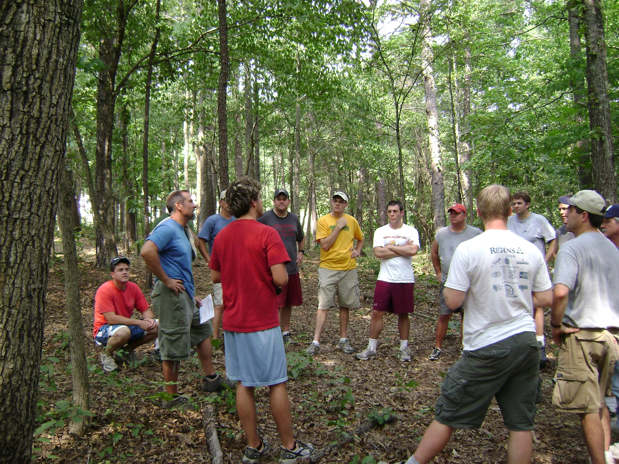 Holt leading an activity at a Trailblazer's men's retreat.JPG
